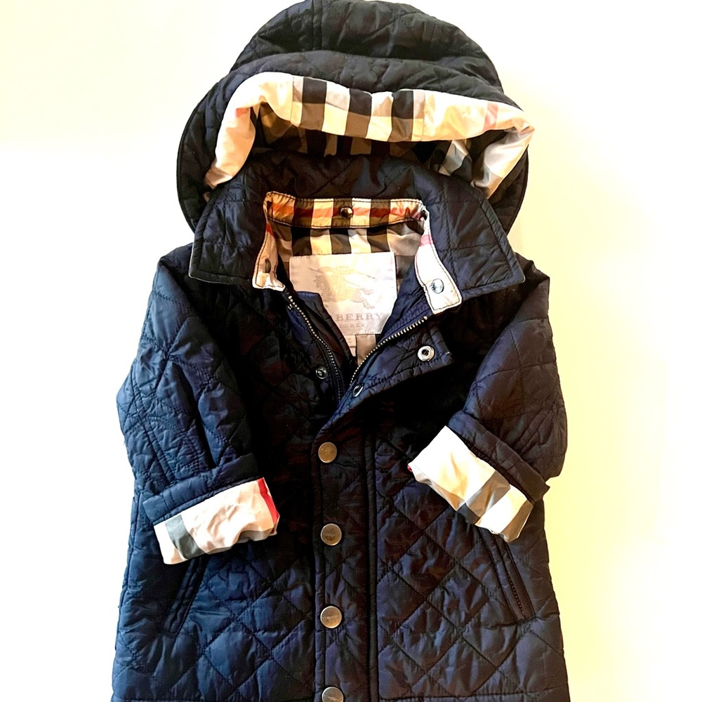 Burberry baby jacket size 12m. Navy blue. Good condition with removable hood.